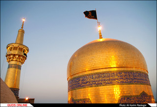 آیین تعویض پرچم گنبد منور حضرت رضا(ع)