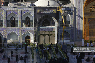 آیین تعویض پرچم گنبد حرم مطهر امام رضا علیه السلام
