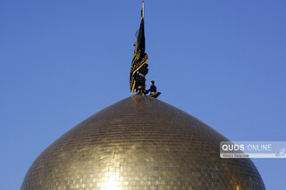 آیین تعویض پرچم گنبد حرم مطهر امام رضا علیه السلام