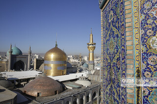 آیین تعویض پرچم گنبد حرم مطهر امام رضا علیه السلام
