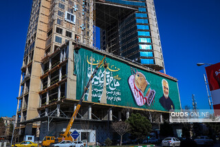 بزرگترین دیوارنگاره کشور منقش به تصویر خادم الرضا(علیه السلام) سردار شهید حاج قاسم سلیمانی
