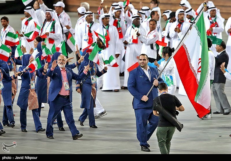 مانور قدرت کاروان ایران با پرچمداری سلیمی/ یانگوم مشعل مسابقات را روشن کرد