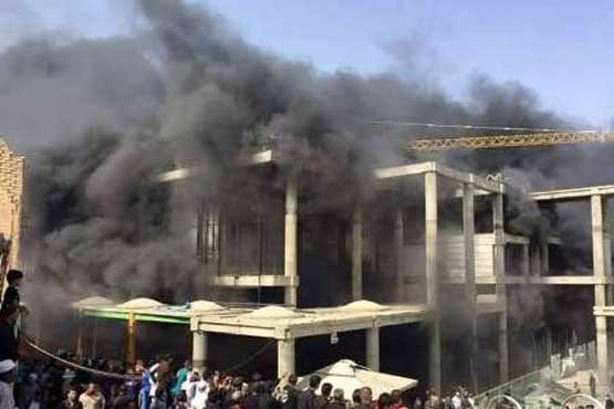 آتش سوزی در اطراف حرم امام علی (ع) تلفات نداشت + عکس