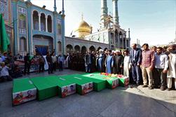 تشییع پیکر هفت شهید مدافع حرم در قم/گزارش تصویری