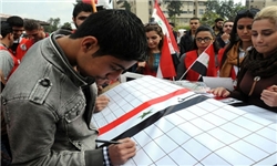 عکس/ امضای طولانی‌ترین طومار جهان در حمایت از بشار اسد