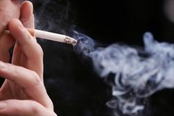 بازیکن پرسپولیس  در حال کشیدن سیگار + عکس