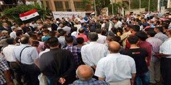 تظاهرات شهروندان سوري در اعتراض به حضور نظاميان آمريكا در شهر رميلان