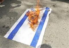 آسوشیتدپرس: لگدمالی پرچم اسرائیل زیر پای مردم ایران