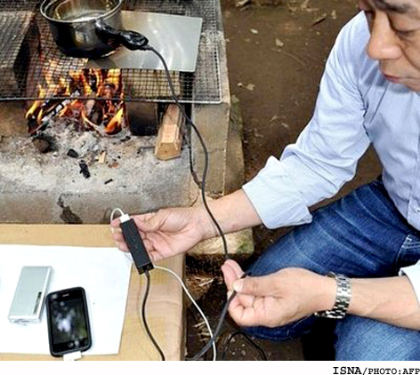 شارژ تلفن همراه بر روی آتش
