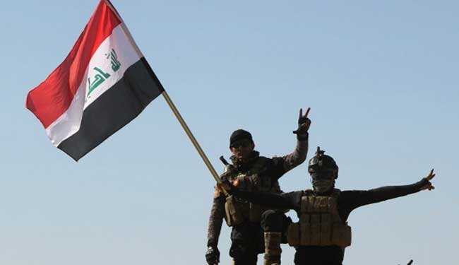 پرچم عراق بر فراز ساختمان‌های دولتی «حمام‌العلیل»