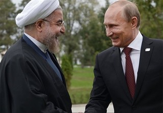 پوتین و روحانی تلفنی درباره توافق آتش‌بس در سوریه گفت‌وگو کردند