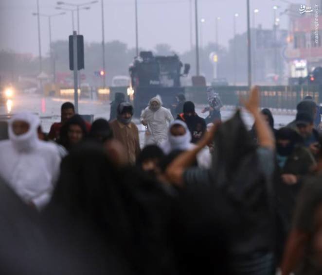 تصاویر/ شدت گرفتن درگیری های مردم بحرین در هوای بارانی