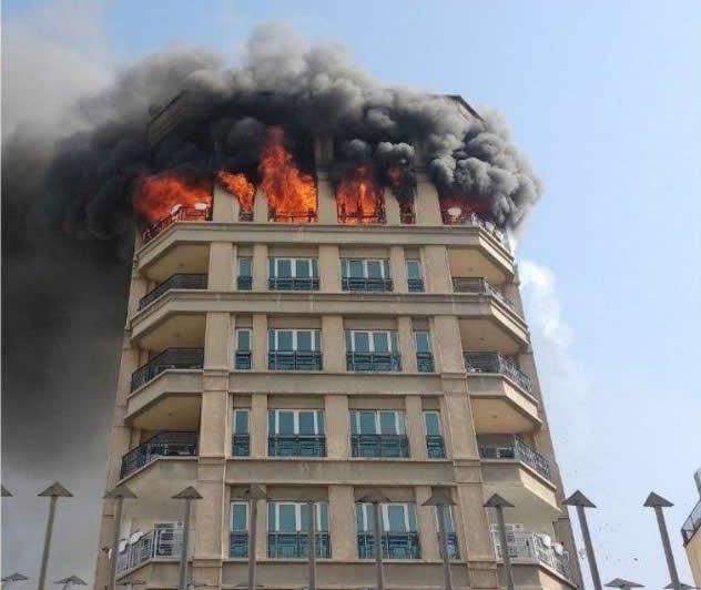آتش سوزی دریک مجتمع مسکونی 9 طبقه در شمال تهران