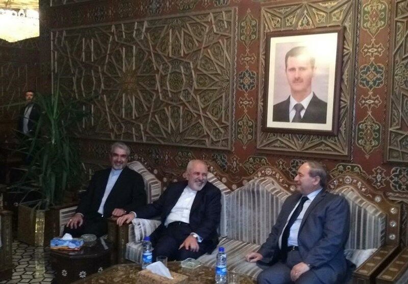 ظریف در فرودگاه دمشق: برای اجرای توافقات دو کشور به سوریه آمده‌ام
