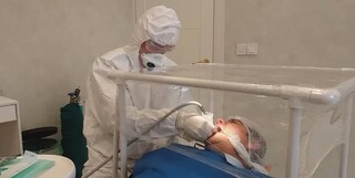 پزشک مشهدی خدمات دندانپزشکی به افراد مشکوک به کرونا و مبتلایان می‌دهد