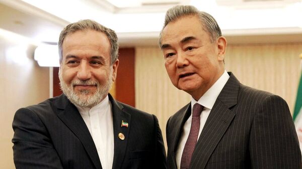 وانگ‌یی در دیدار با عراقچی: چین به حمایت از ایران در مقاومت برابر زورگویی ادامه می‌دهد