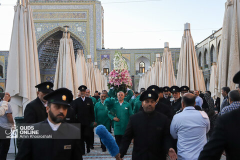 آیین تعویض پرچم گنبد و پوش ضریح مطهر رضوی