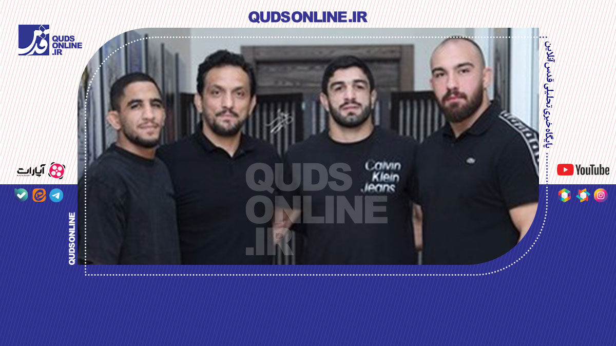 فیلم | ادای احترام قهرمانان کشتی به مادر شهید زین الدین در افتتاحیه فیلم سینمایی «مجنون»