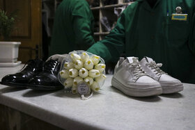 گزارش تصویری | خدمت کفشداری در حرم مطهر رضوی