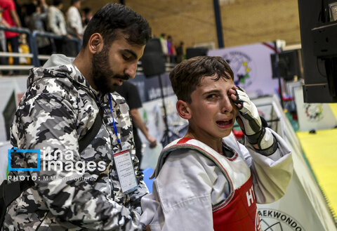 عکس منتخب هفته | از سفر هاکان فیدان به تهران تا اولین باران پاییزی در مشهد