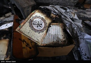 عکس منتخب هفته | از آتش اغتشاش در ایران تا بدرقه ۱۰۰ شهید در تهران