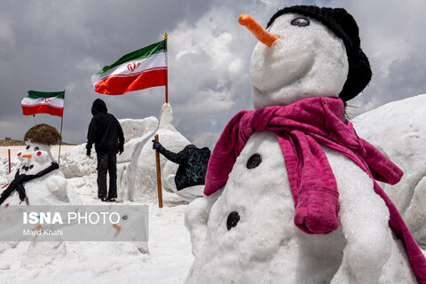 گزارش تصویری | تصاویری دیدنی از جشنواره آدم برفی در نیمه خرداد - توچال
