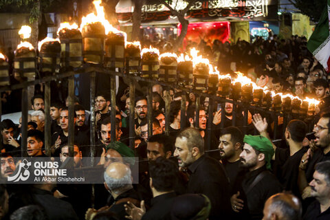 گزارش تصویری | آیین مشعل گردانی و مشق شمشیر نجفی های مقیم مشهد
