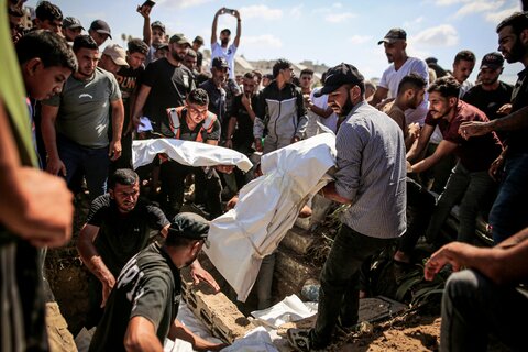 عکس | تشییع ۱۰۰ فلسطینی در غزه
